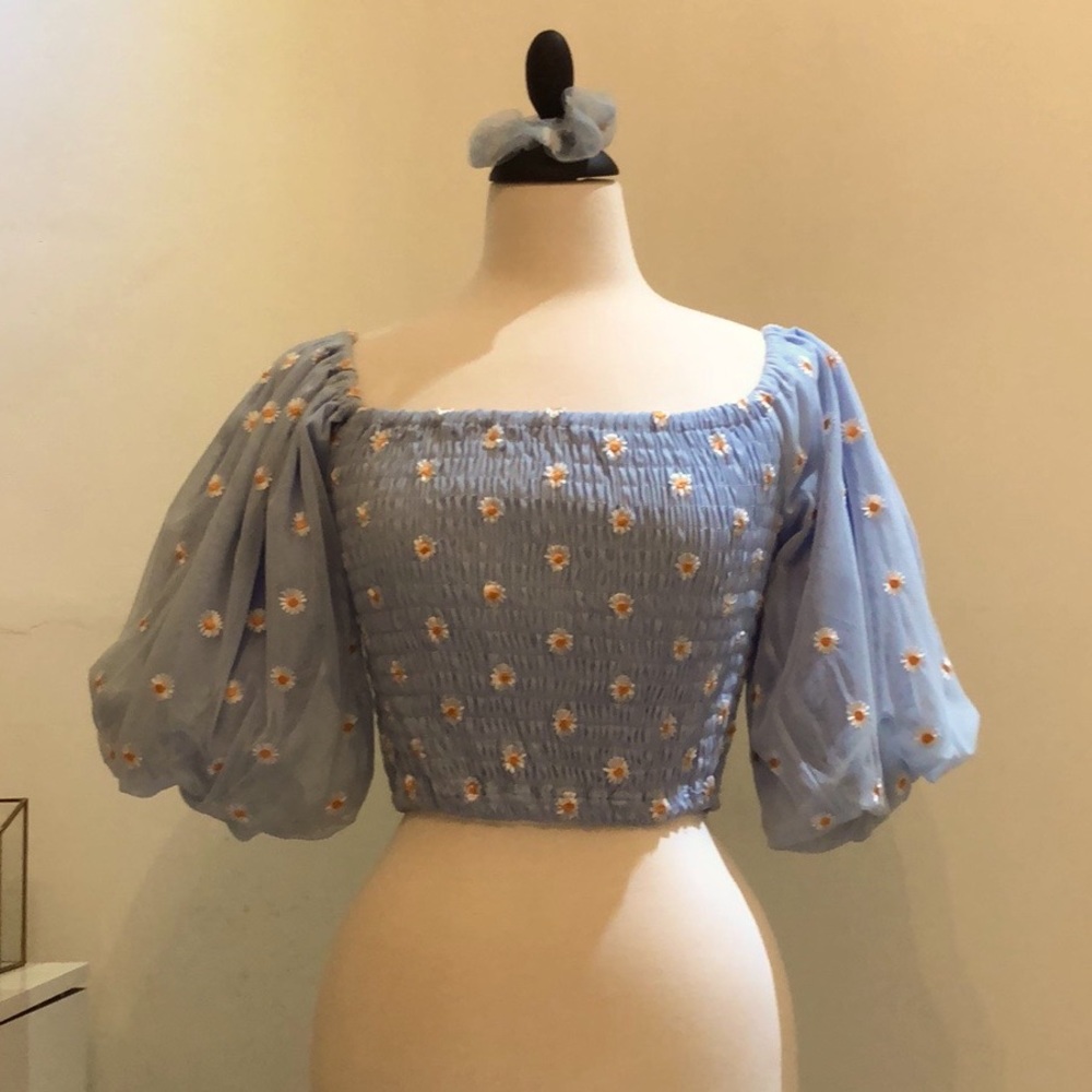 Laros light blue off the shoulder top in size small.